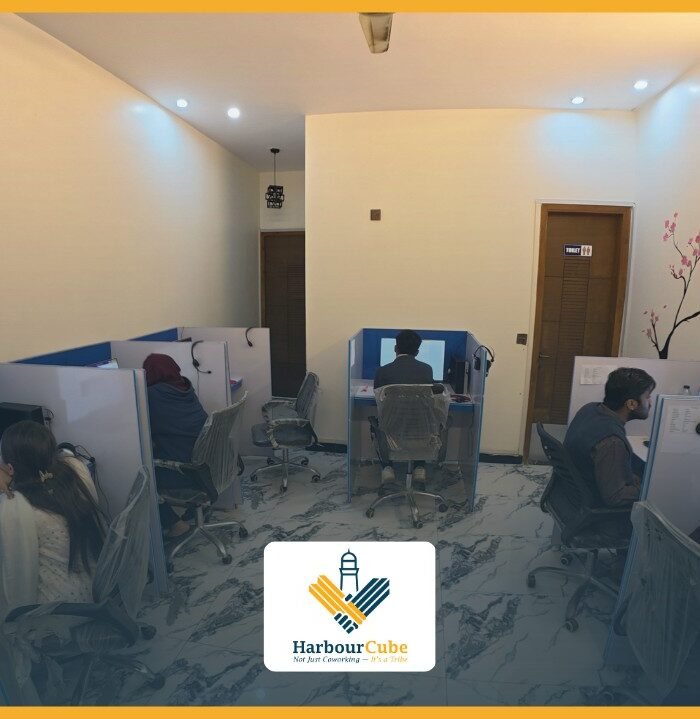 Individual workstations at HarbourCube coworking space in Karachi